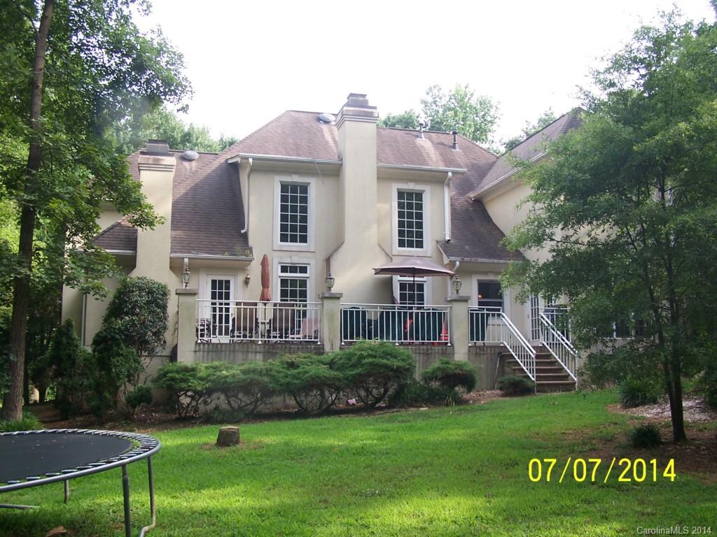 2405 New Salem Road Monroe, NC 28110 - Photo 16 of 20 a front view of a house with a garden