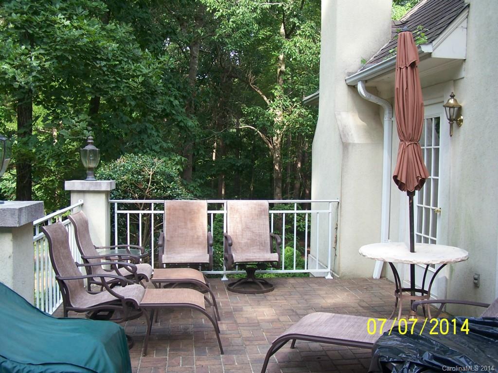 2405 New Salem Road Monroe, NC 28110 - Photo 18 of 20 a view of a patio with a table chairs and a fire pit