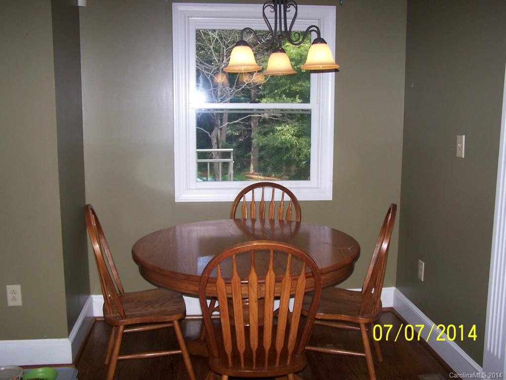 2405 New Salem Road Monroe, NC 28110 - Photo 5 of 20 a view of a dining room with furniture window and outside view