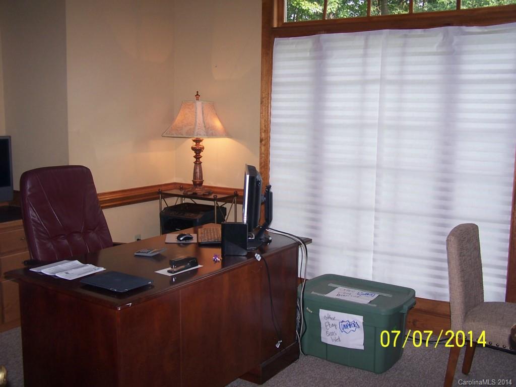 2405 New Salem Road Monroe, NC 28110 - Photo 8 of 20 a living room with furniture and a lamp