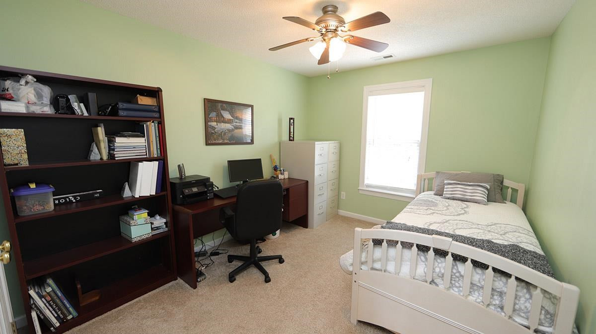 3820 Evander Way Raleigh, NC 27613 - Photo 24 of 30 This bedroom is being used as a guest room/office. Bedroom