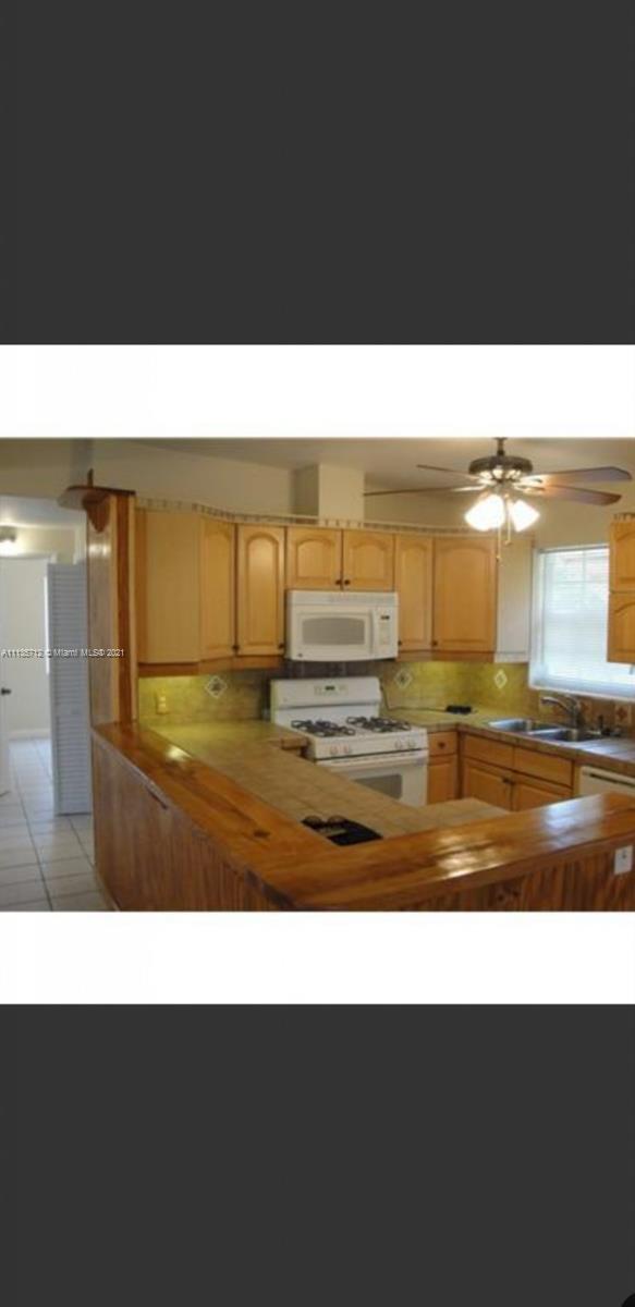 5566 South Rue Road West Palm Beach, FL 33415 - Photo 6 of 10 a picture of a floor plan