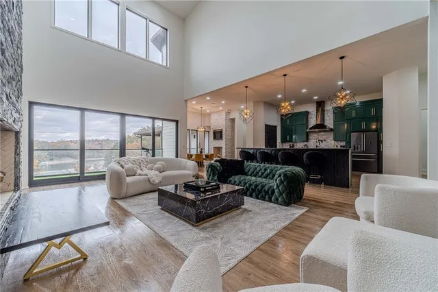 a en suite bathroom with a granite countertop sink and a mirror