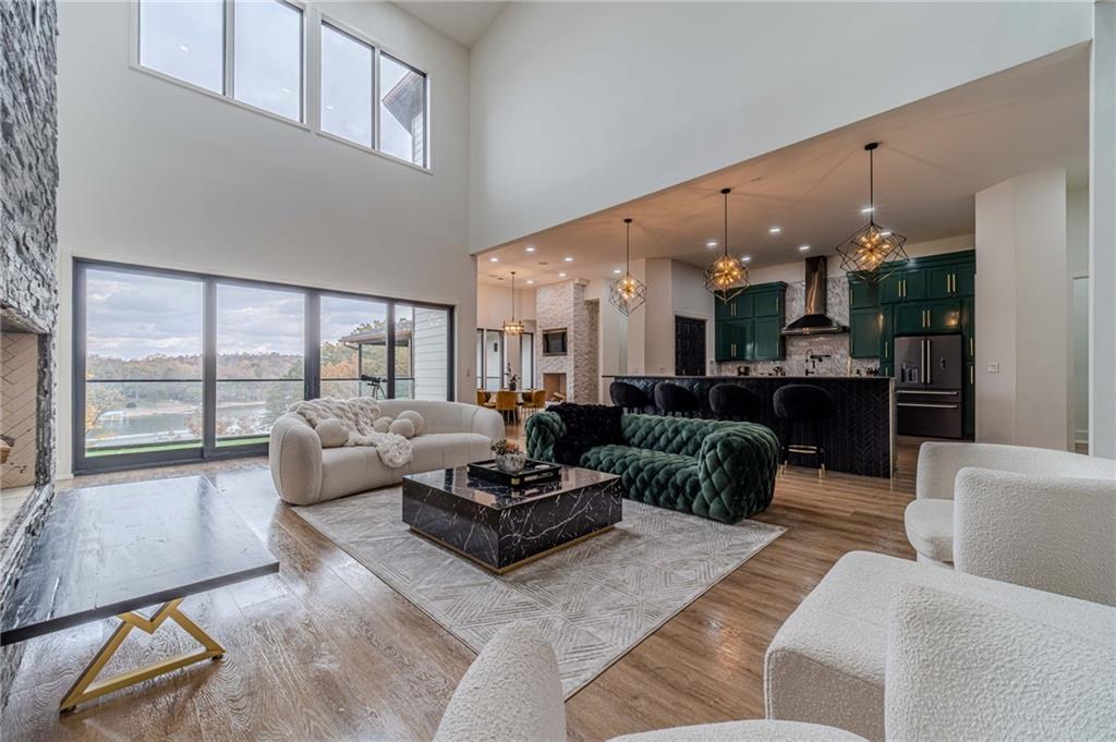 494 River Overlook Road Dawsonville, GA 30534 - Photo 17 of 90 a living room with furniture and a large window