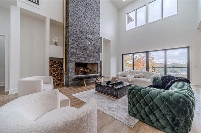 a spacious bedroom with a bed and a window