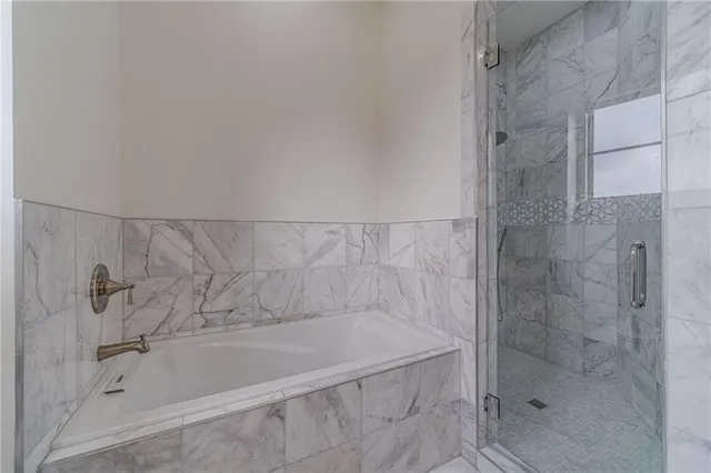 a view of yard with swimming pool and green space