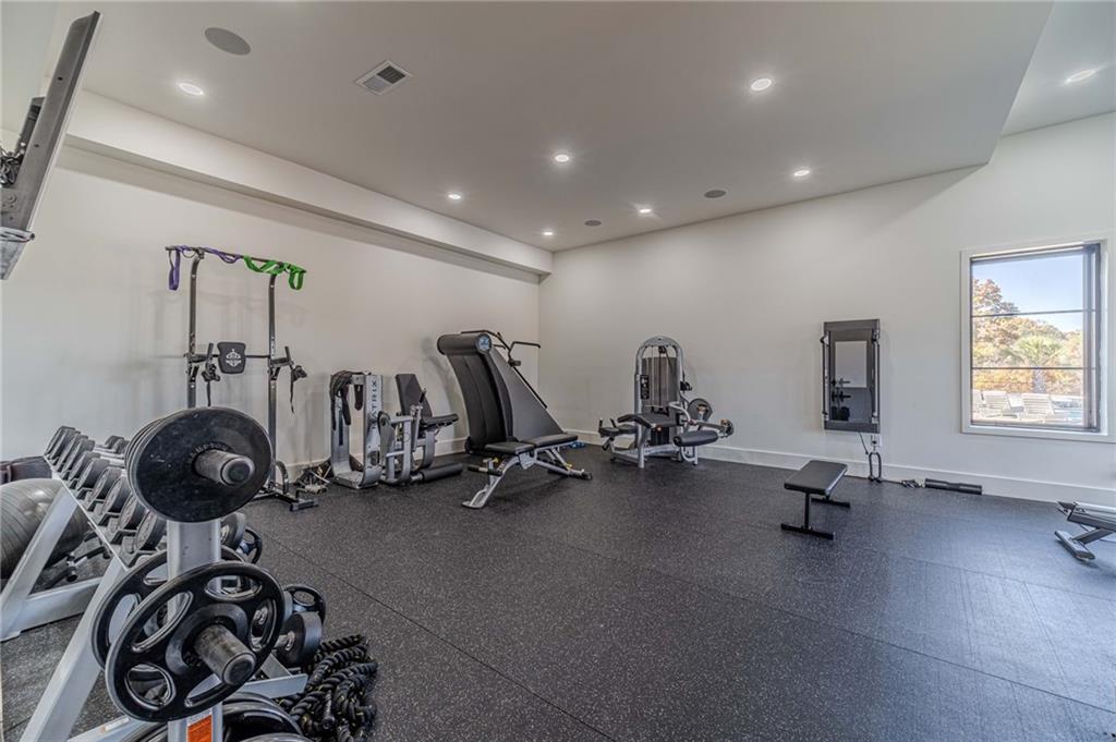 494 River Overlook Road Dawsonville, GA 30534 - Photo 59 of 90 a view of a room with gym equipment