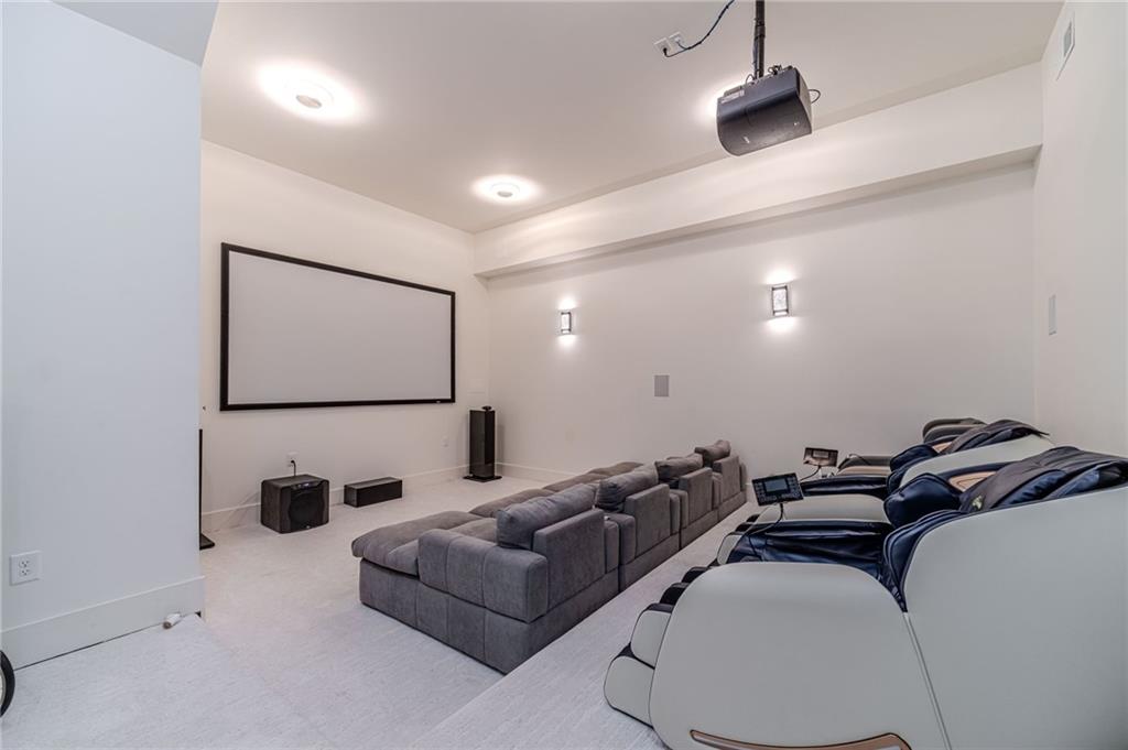 494 River Overlook Road Dawsonville, GA 30534 - Photo 61 of 90 a living room with furniture and a flat screen tv