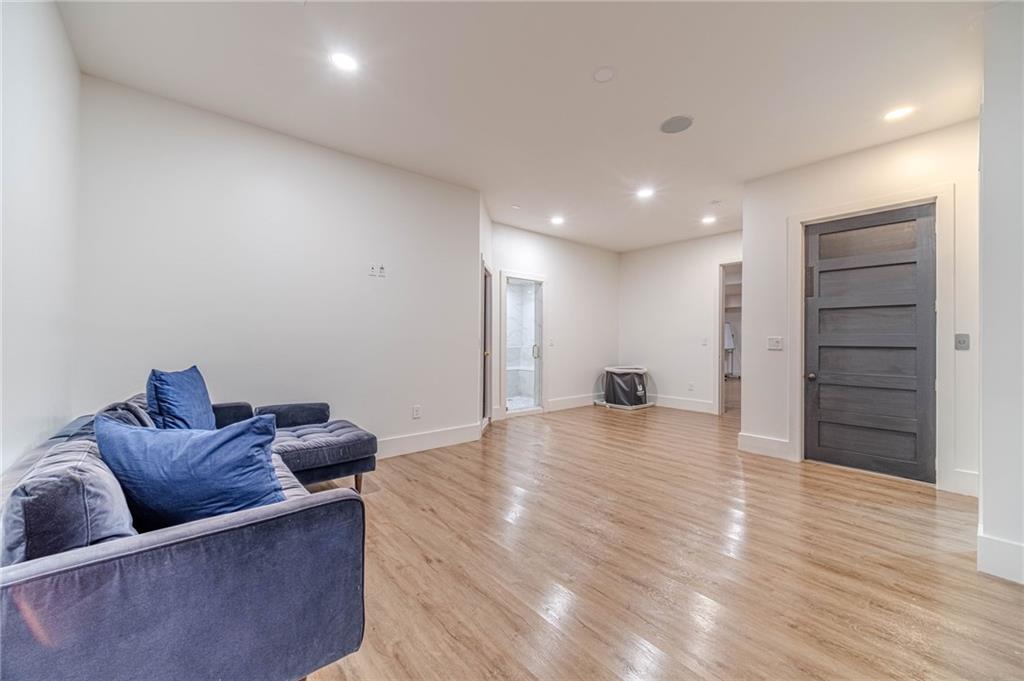 494 River Overlook Road Dawsonville, GA 30534 - Photo 63 of 90 a living room with furniture and a dresser