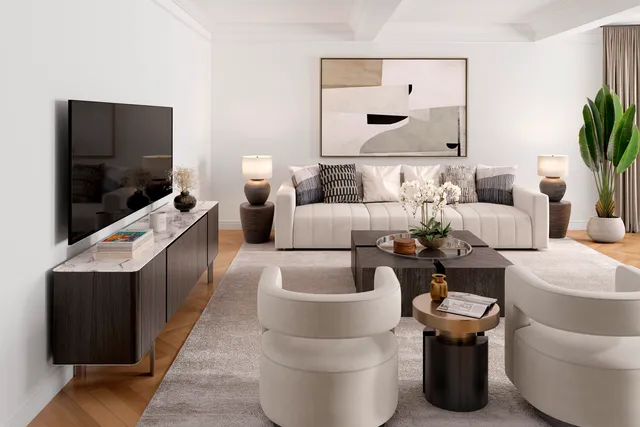 a living room with furniture a flat screen tv and kitchen view