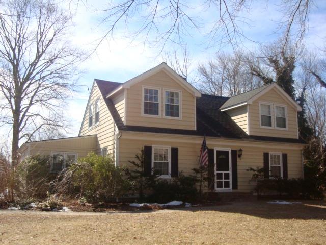 51 Neck Road Madison, CT 06443 - Photo 1 of 1 a front view of a house with yard