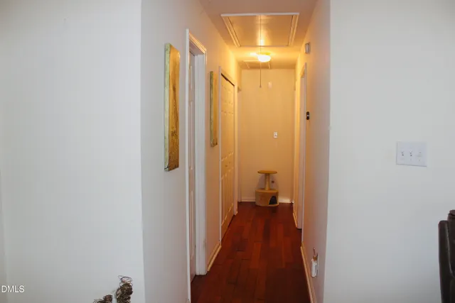 a view of a bathroom from the hallway