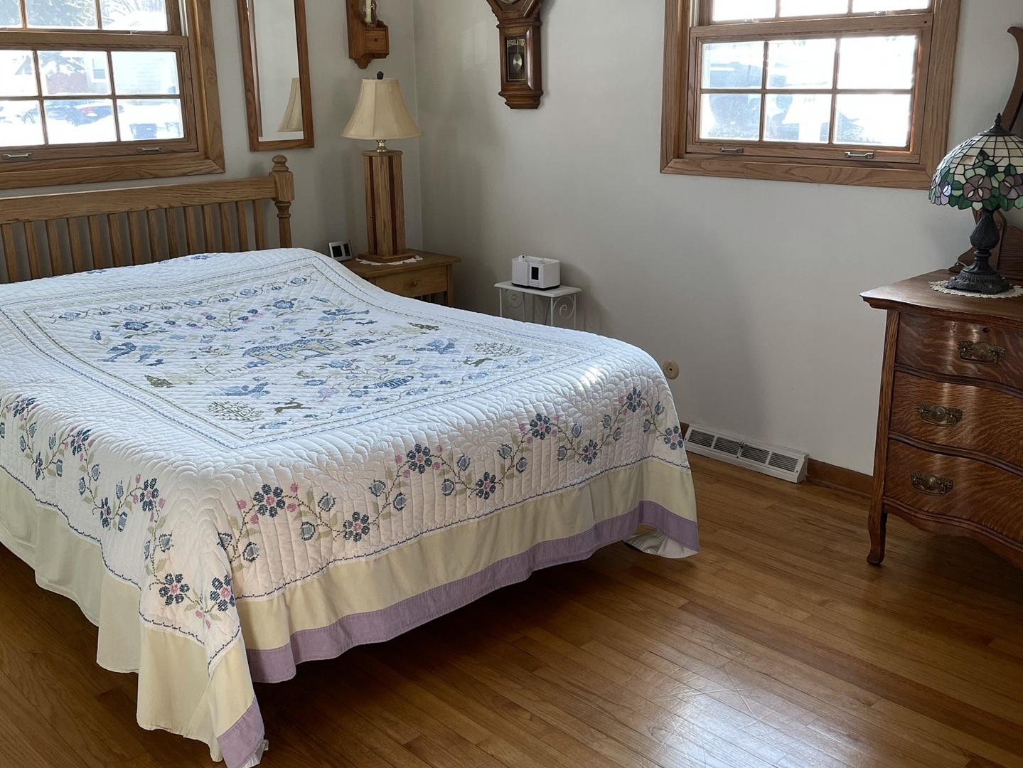 216 Pauline Drive Elgin, IL 60123 - Photo 3 of 20 a bed sitting in a bedroom next to a window