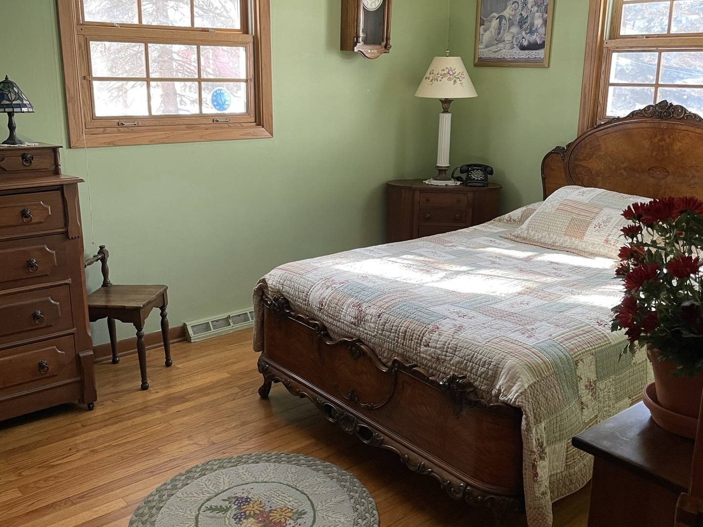 216 Pauline Drive Elgin, IL 60123 - Photo 4 of 20 a bedroom with a bed and a table in it