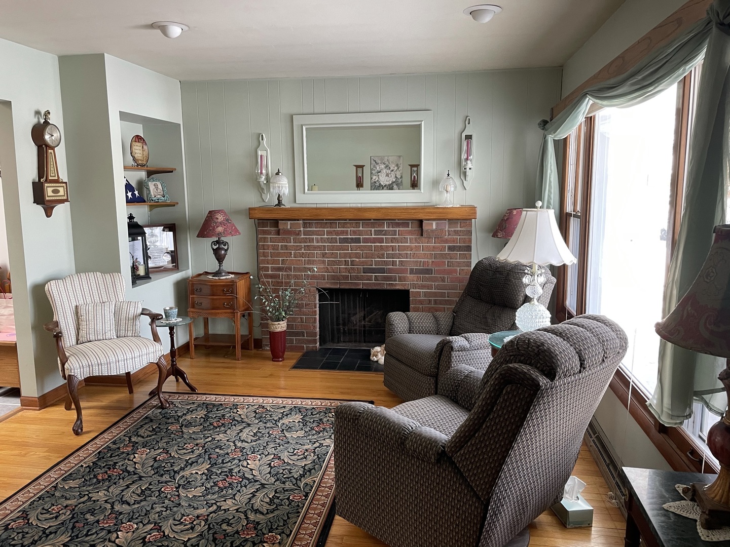 216 Pauline Drive Elgin, IL 60123 - Photo 6 of 20 a living room with furniture and a fireplace