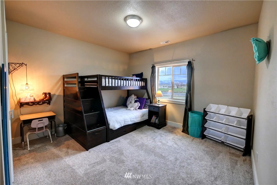 81 Jaquish Road Omak, WA 98841 - Photo 36 of 40 a bedroom with furniture and a window