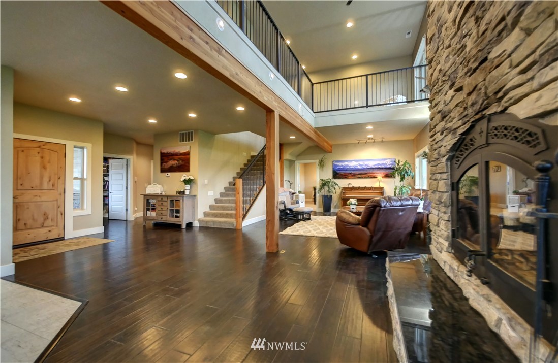 81 Jaquish Road Omak, WA 98841 - Photo 5 of 40 a living room with furniture and a flat screen tv