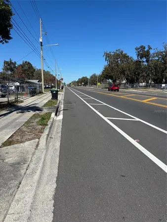 a view of a city street from a cars park