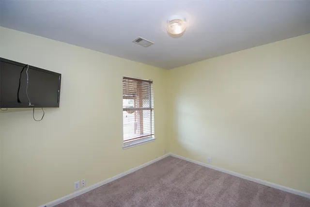 a view of storage and utility room with washer and dryer