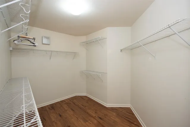 a view of a patio with a table and chairs