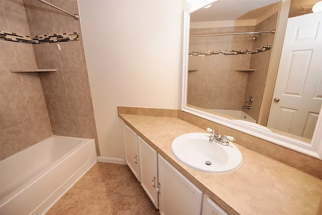 wooden floor in an empty room with a fireplace
