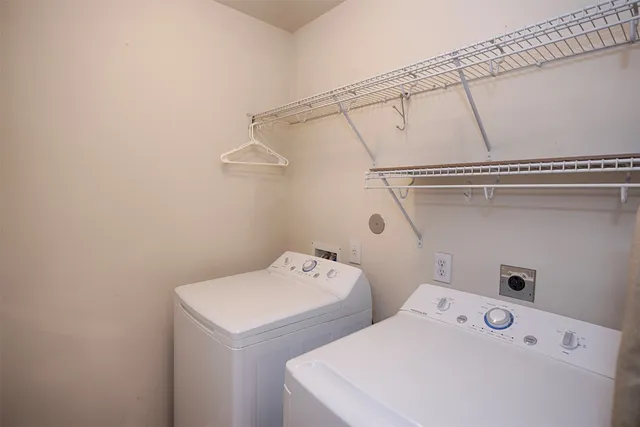 a view of a swimming pool with a yard