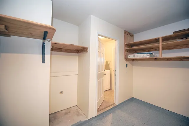 a large kitchen with cabinets