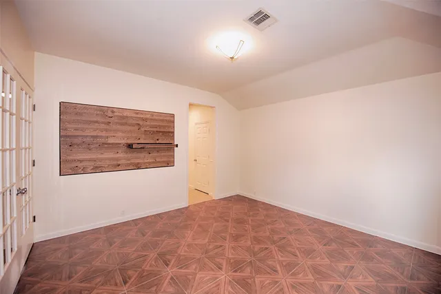a view of a kitchen with a sink cabinet and a window