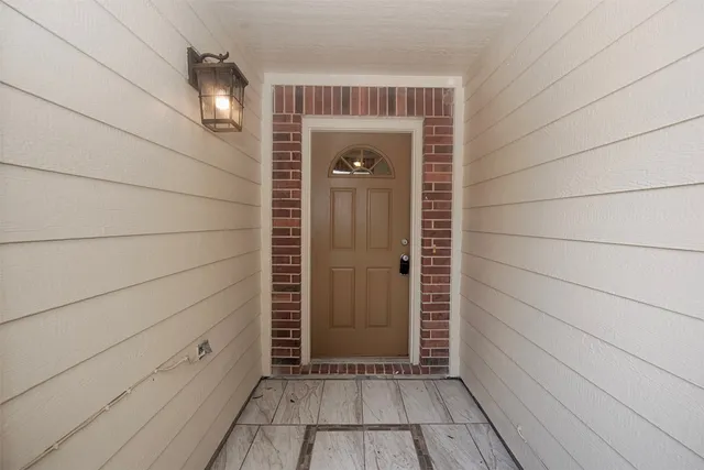 a bathroom with a shower and a tub