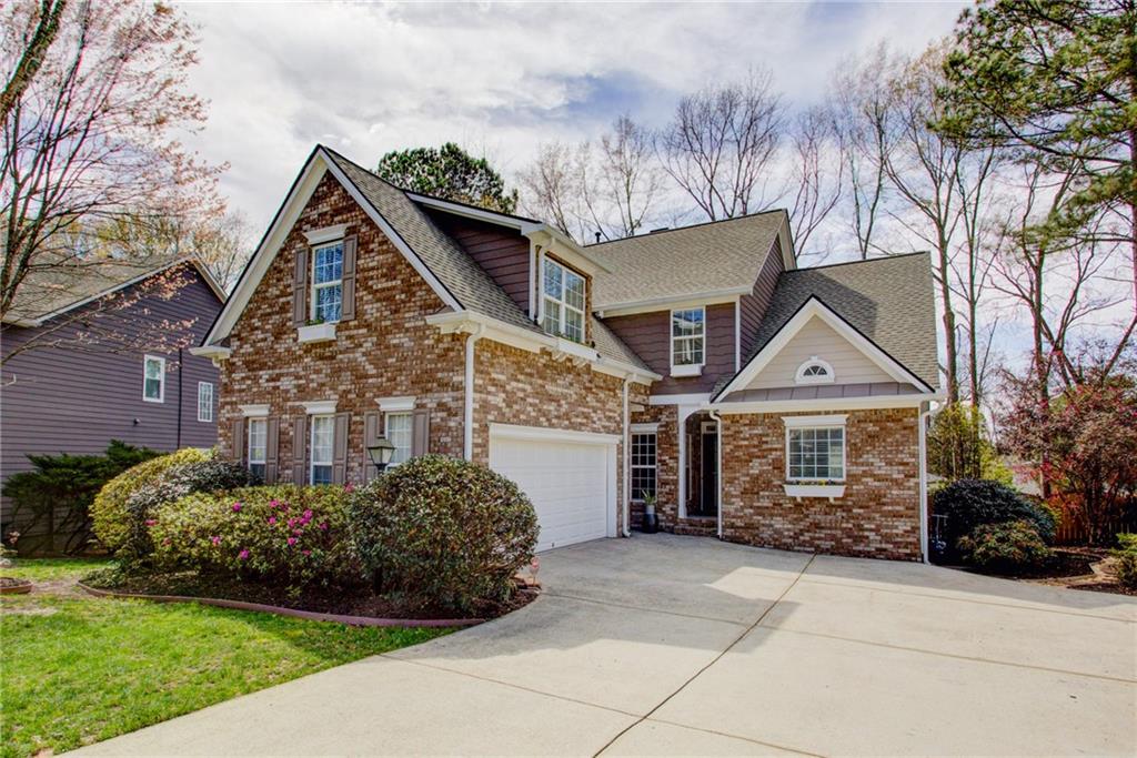 1271 Crescentwood Lane Decatur, GA 30032 - Photo 1 of 1 a front view of a house with garden