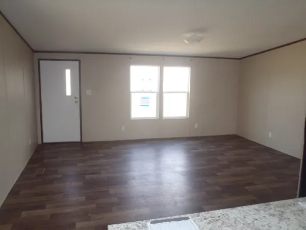 a view of a kitchen with a sink and a window