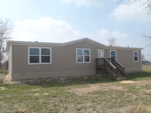 front view of house with a yard