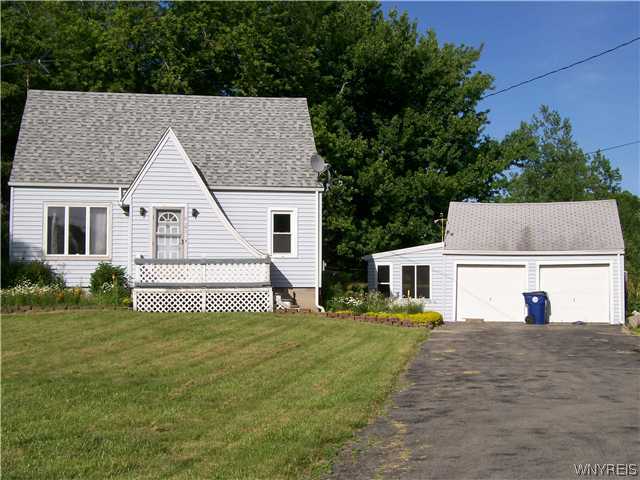 2493 Sweet Home Road Amherst, NY 14228 - Photo 1 of 1 Exterior Front Front porch, detacted garage w/an a