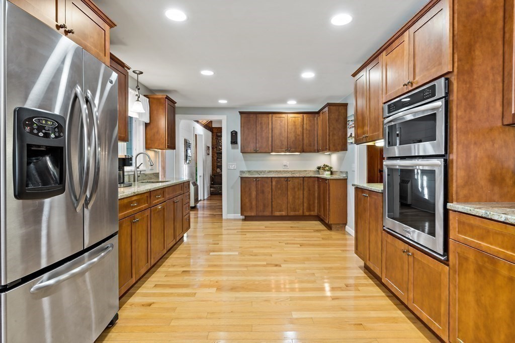 482 Delano Road Marion, MA 02738 - Photo 13 of 35 a kitchen with stainless steel appliances granite countertop a refrigerator and a sink
