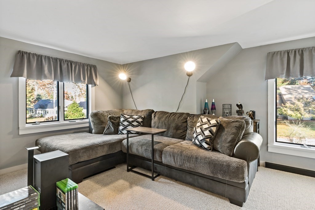 482 Delano Road Marion, MA 02738 - Photo 33 of 35 a living room with furniture and a large window