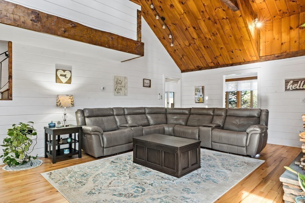 482 Delano Road Marion, MA 02738 - Photo 10 of 35 a living room with furniture and wooden floor