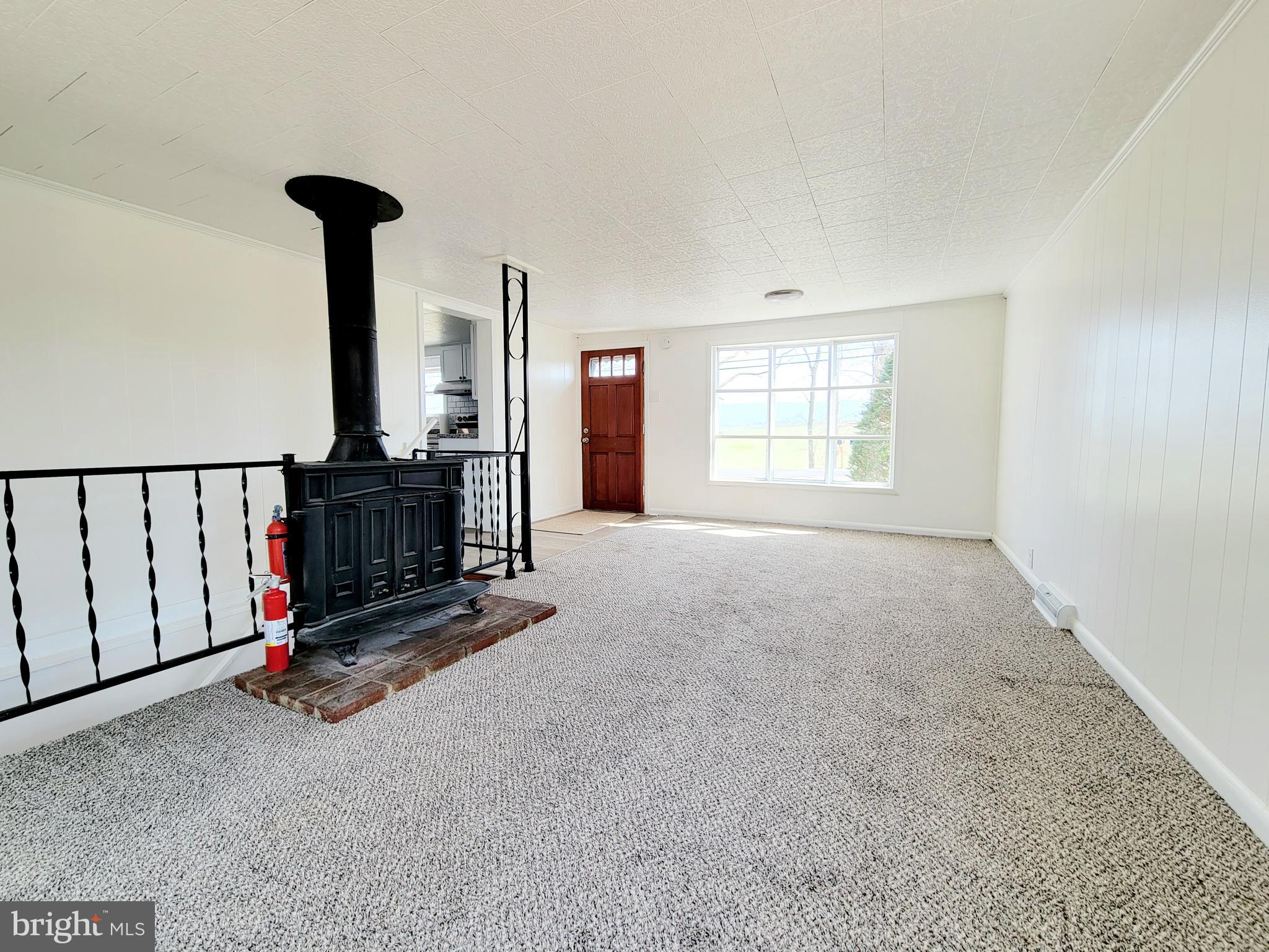 11838 Kieffer Funk Road Hagerstown, MD 21742 - Photo 15 of 34 Family room & wood stove