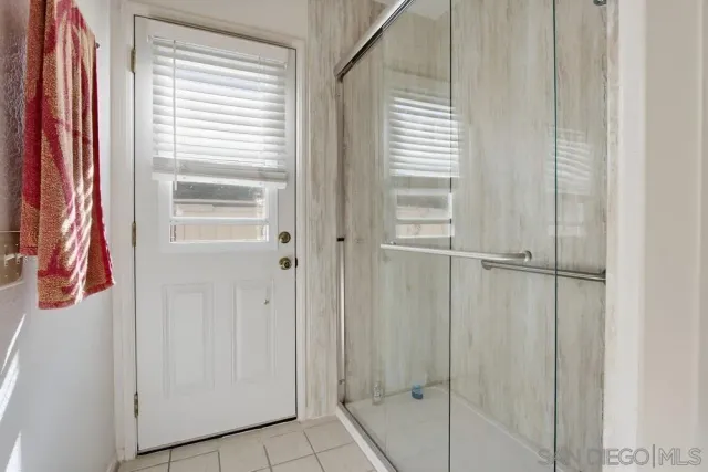 a view of a closet area with living room