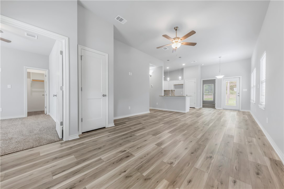 1803 Pin Oak Street Bryan, TX 77803 - Photo 2 of 17 a view of an empty room and kitchen view