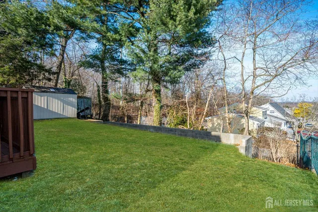 an aerial view of a house with garden space