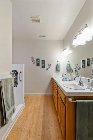 a bathroom with a sink and a mirror