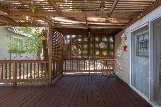 a view of porch with wooden floor