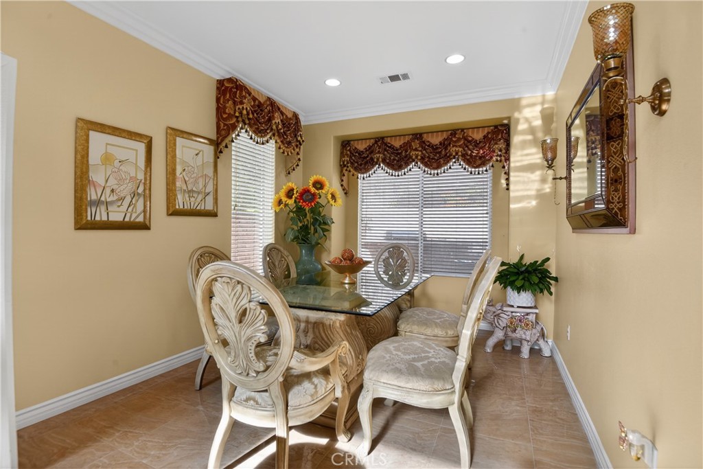 2621 Fallen Leaf Court Simi Valley, CA 93063 - Photo 28 of 58 a view of a dining room with furniture window and wooden floor