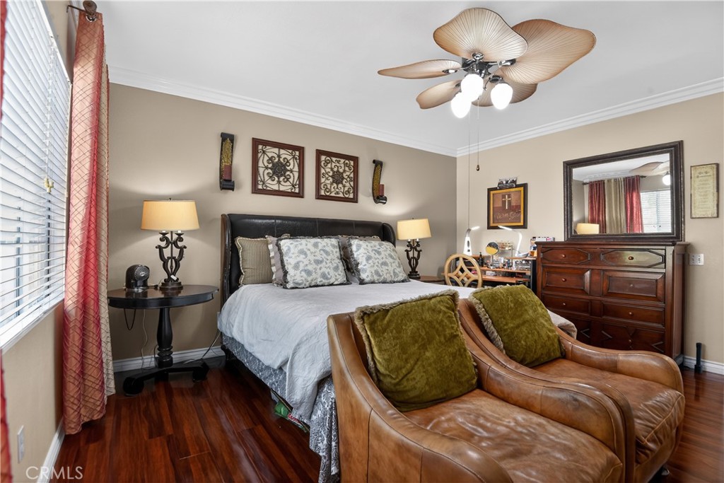 2621 Fallen Leaf Court Simi Valley, CA 93063 - Photo 30 of 58 a bedroom with a bed and wooden floor