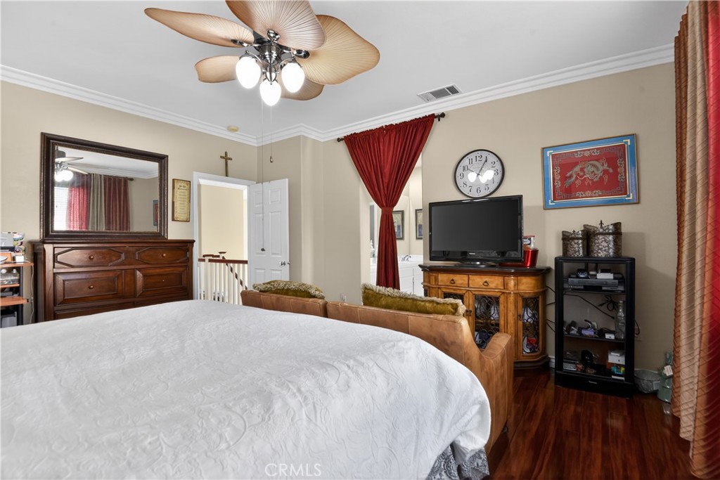 2621 Fallen Leaf Court Simi Valley, CA 93063 - Photo 33 of 58 a bedroom with a bed and a flat screen tv