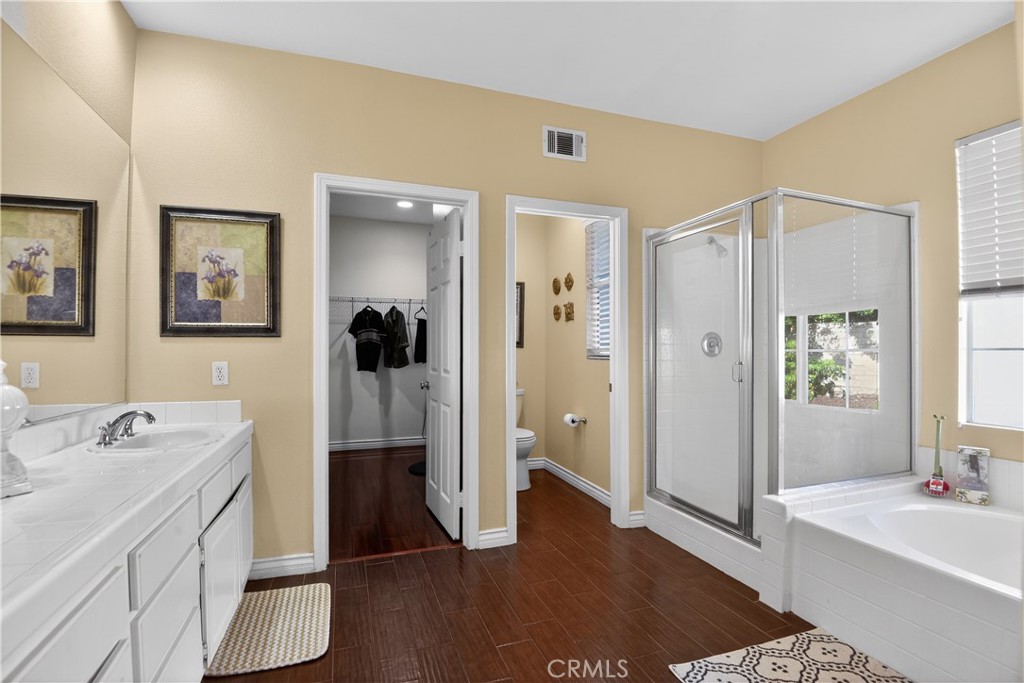 2621 Fallen Leaf Court Simi Valley, CA 93063 - Photo 35 of 58 a bathroom with a sink a toilet and shower