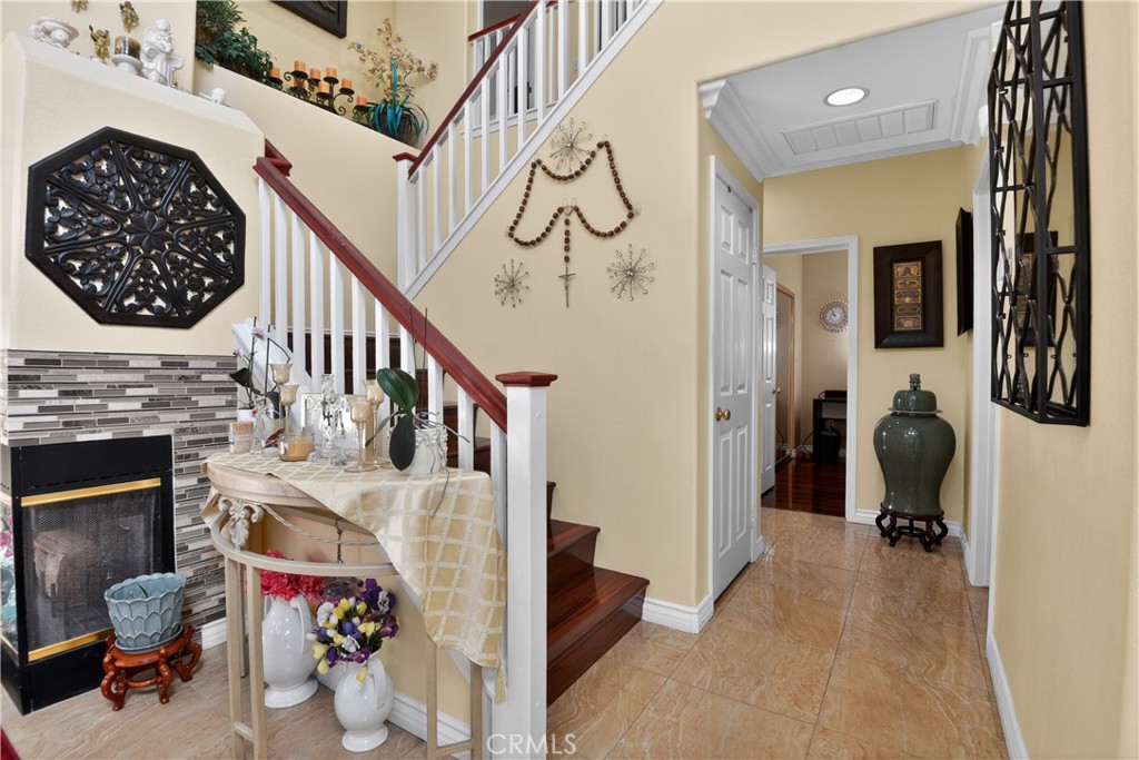 2621 Fallen Leaf Court Simi Valley, CA 93063 - Photo 57 of 58 a living room with furniture and a fireplace
