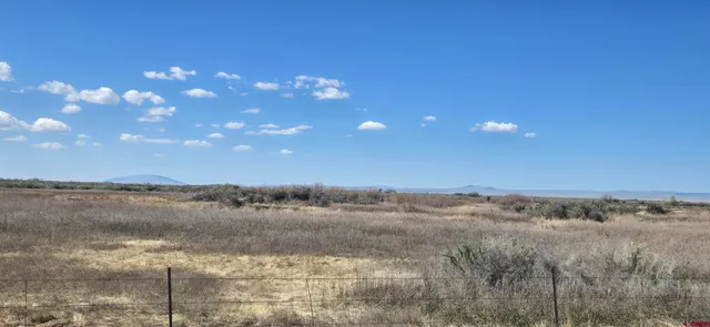 a view of a lake and mountain in the back