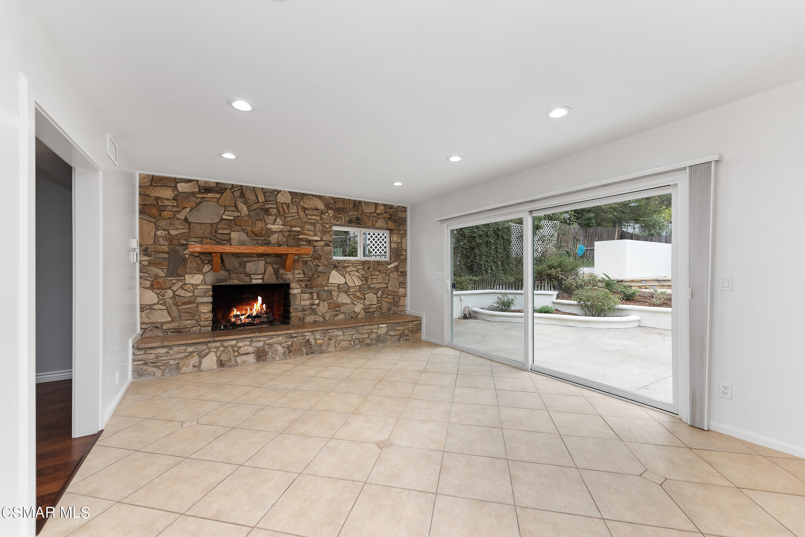 692 Rancho Road Thousand Oaks, CA 91362 - Photo 14 of 55 a view of open kitchen with furniture and a fireplace