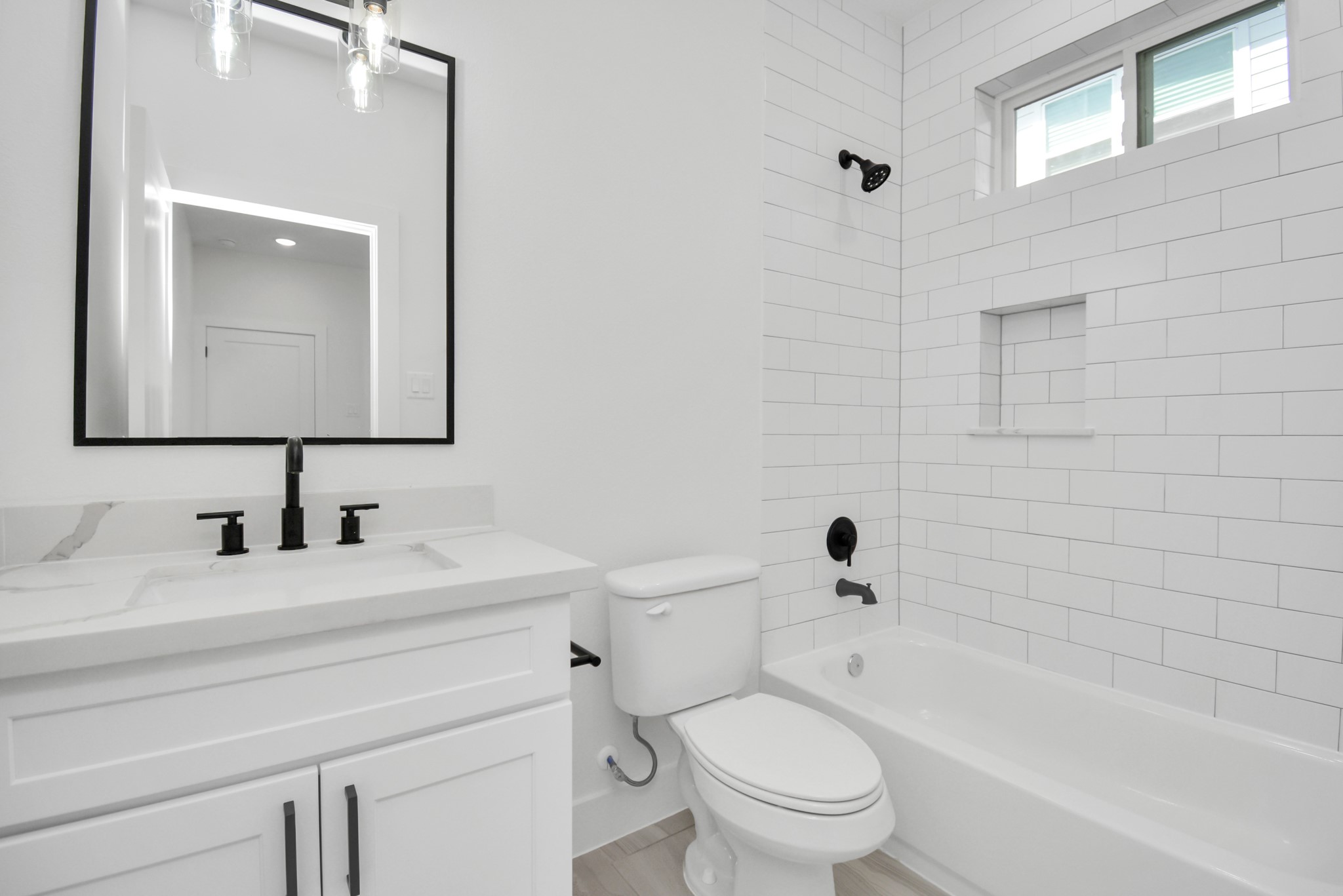 3036 Live Oak Street Houston, TX 77004 - Photo 7 of 35 Photos are of a neighboring home with the same floor plan and similar finishes.